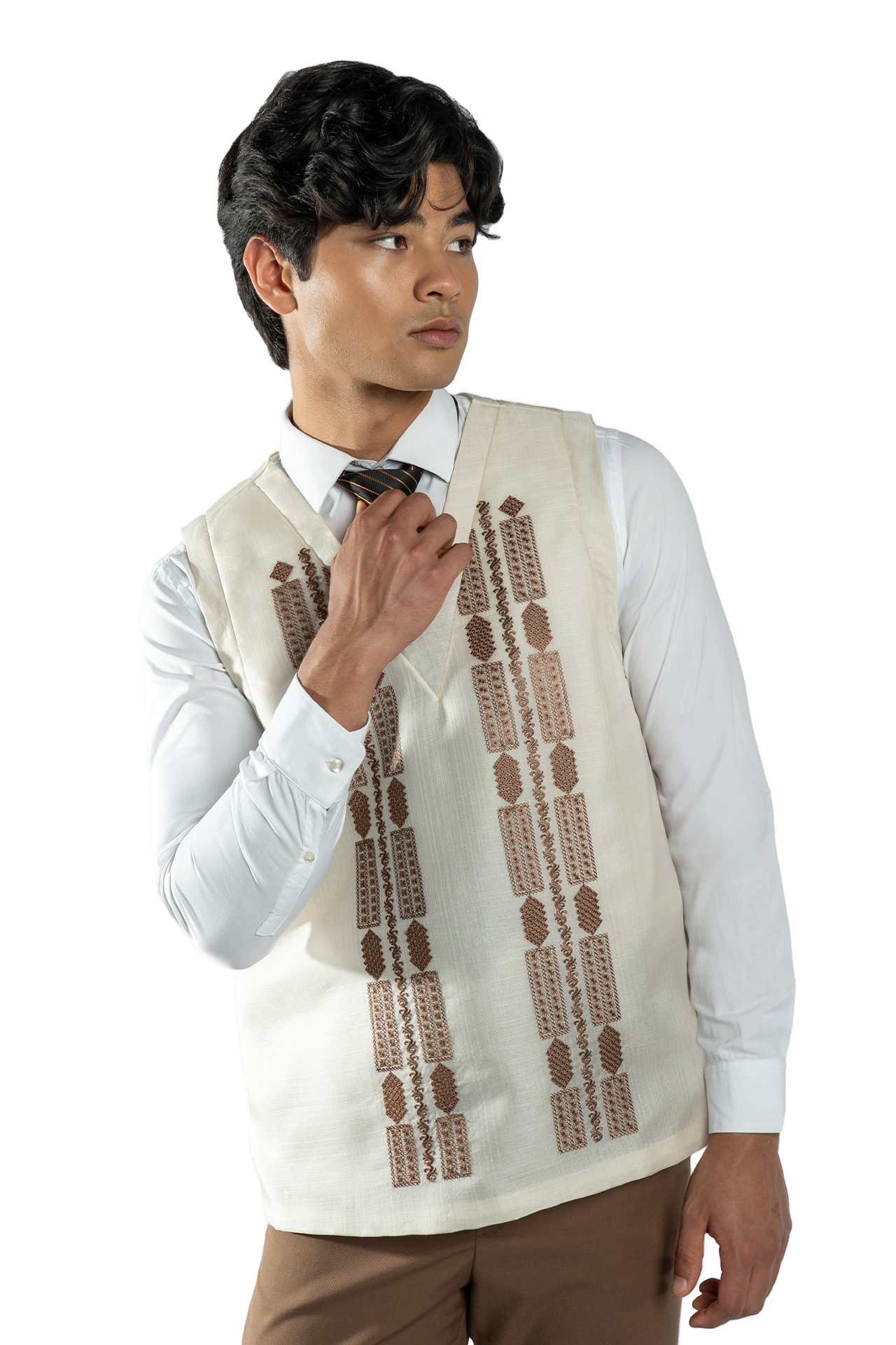 Man wearing a white shirt with a brown patterned vest on a white background